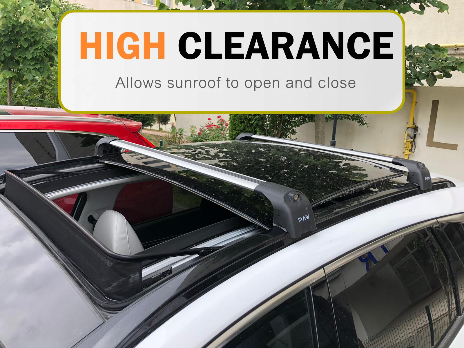 Car with roof rack system and 'High Clearance' label on a vehicle background